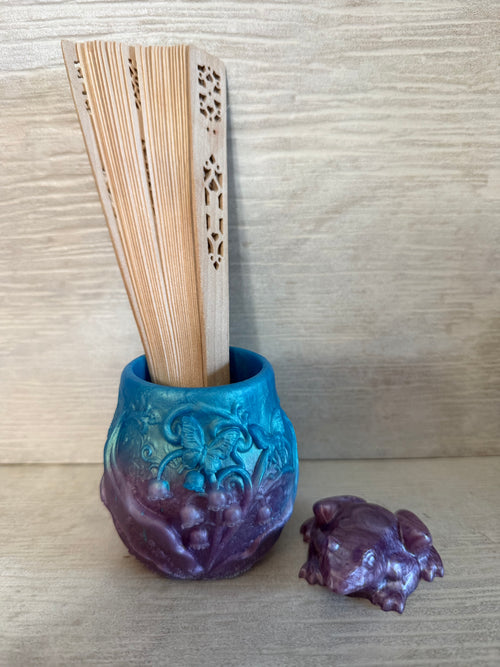 Custom small resin vase in blue-to-purple gradient with embossed butterfly and floral design